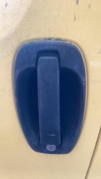 Poignee porte avant gauche