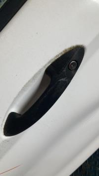 Poignee porte avant gauche