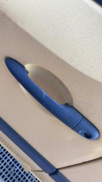 Poignee porte avant gauche
