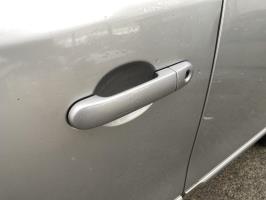Poignee porte avant gauche