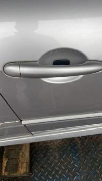 Poignee porte avant droit