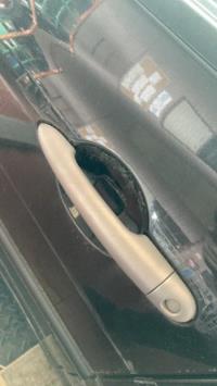 Poignee porte avant gauche