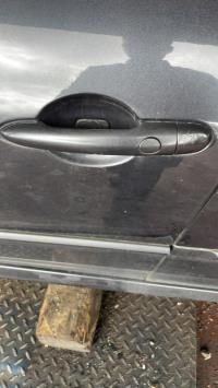 Poignee porte avant gauche