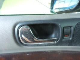 Poignee interieur avant gauche