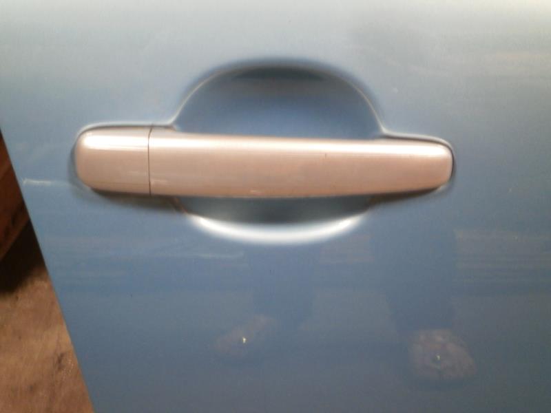Poignee porte arriere droit