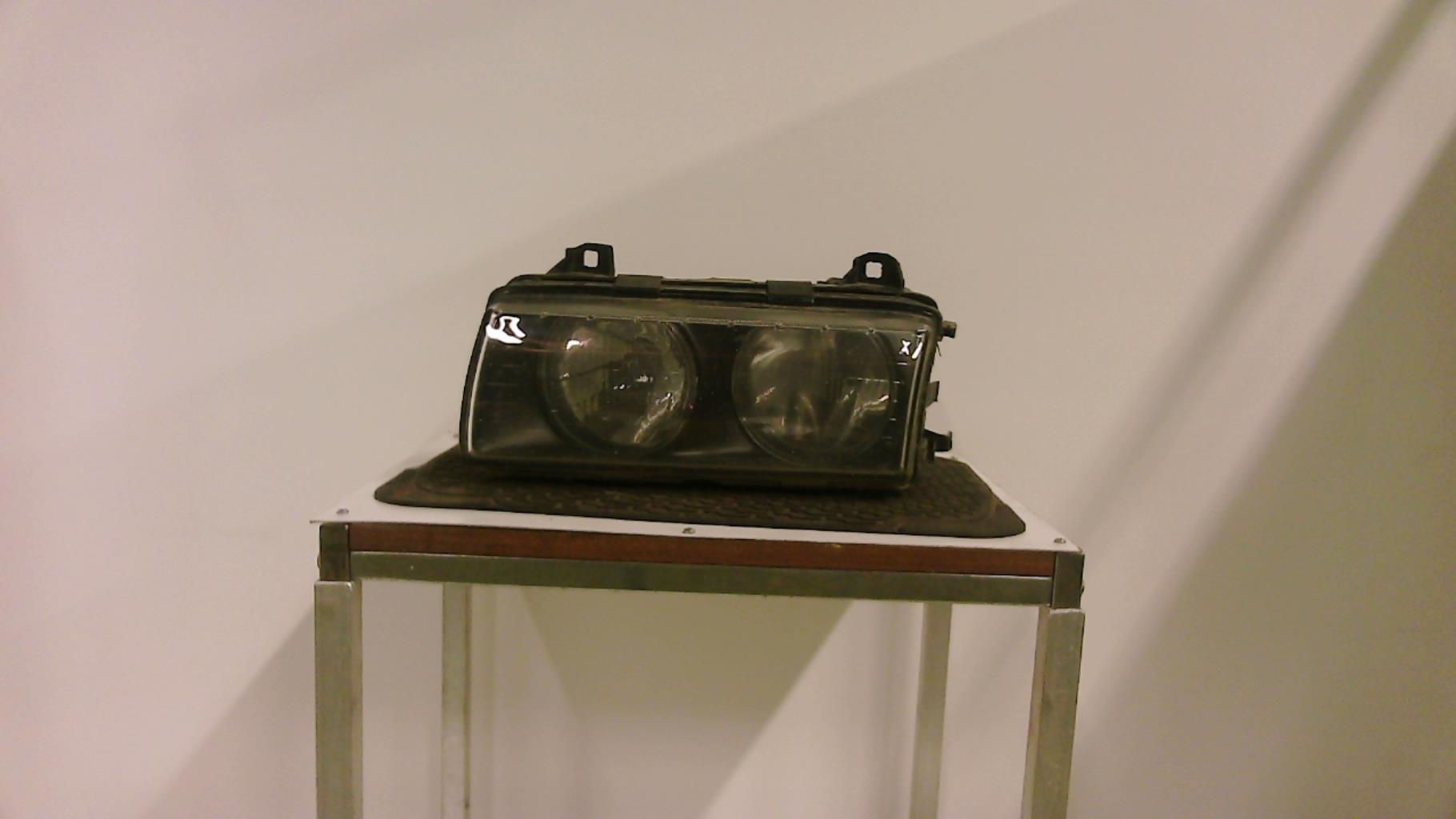 Optique avant principal gauche (feux)(phare)