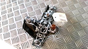 Tail light bulb cover holder