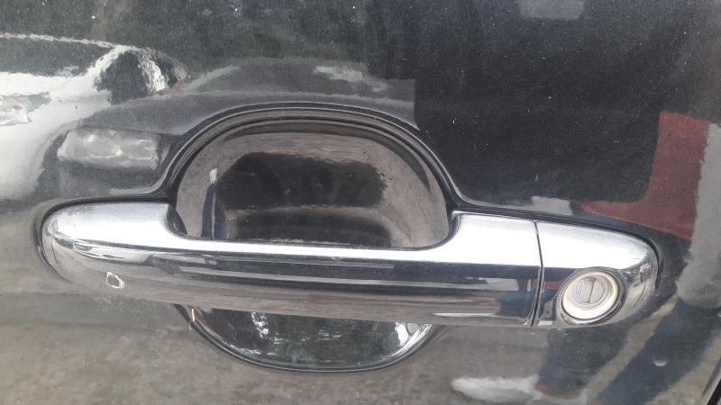 Poignee porte avant gauche