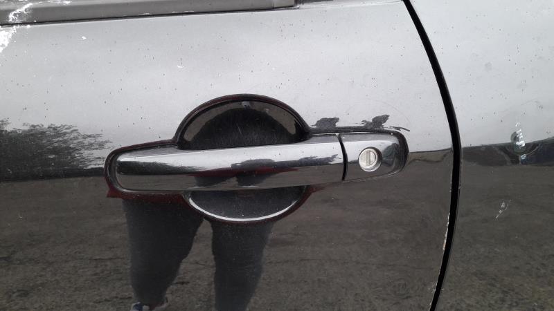 Poignee porte avant gauche