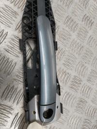 Poignee porte avant gauche