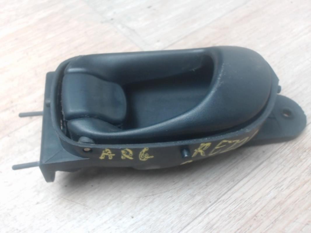 Poignee porte arriere gauche