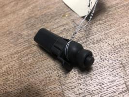 Attuatore chiavistello sportello carburante