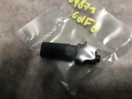 Attuatore chiavistello sportello carburante