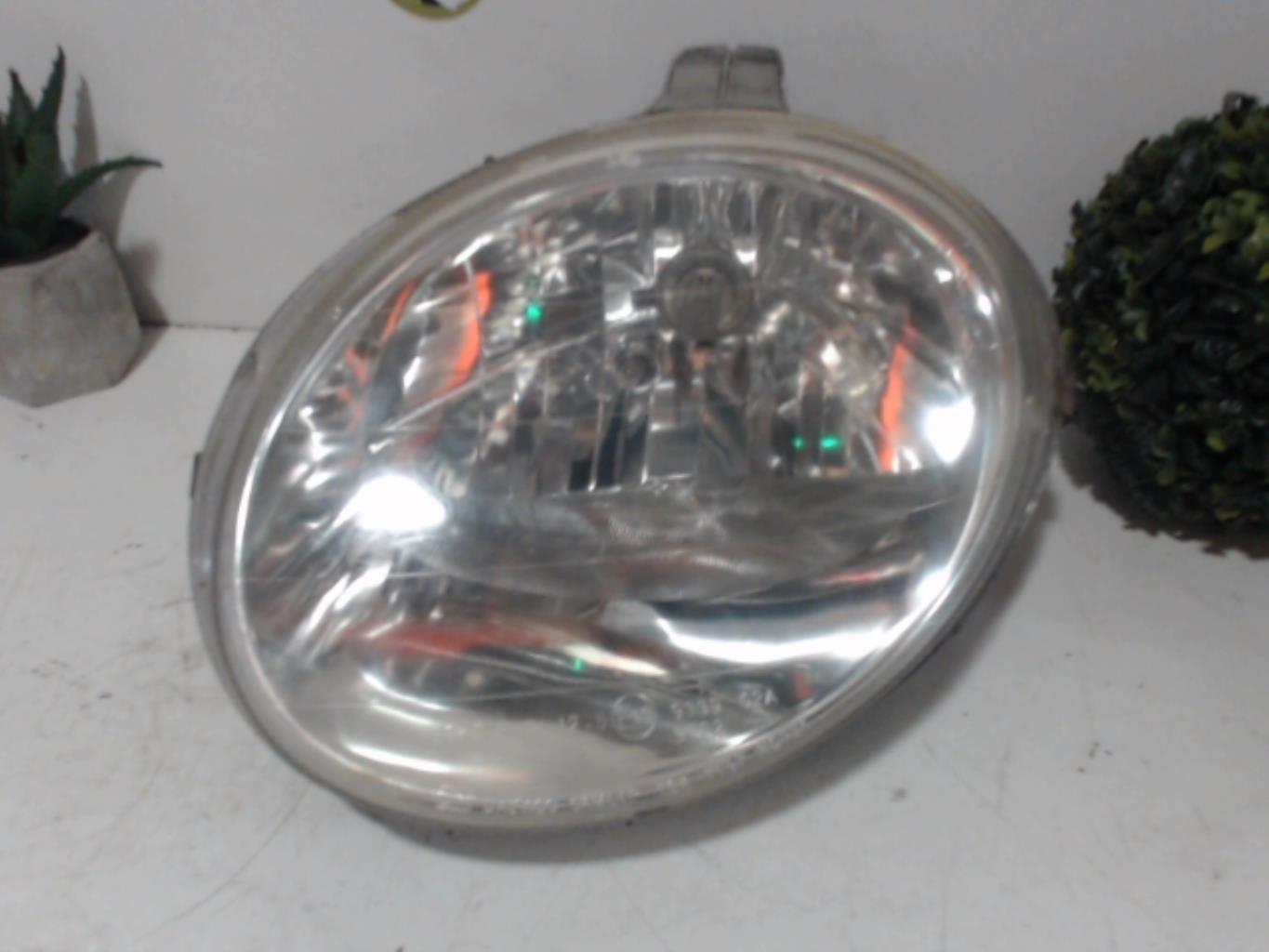 Optique avant principal gauche (feux)(phare)