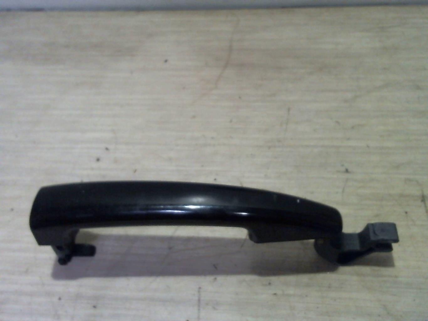 Poignee porte avant gauche