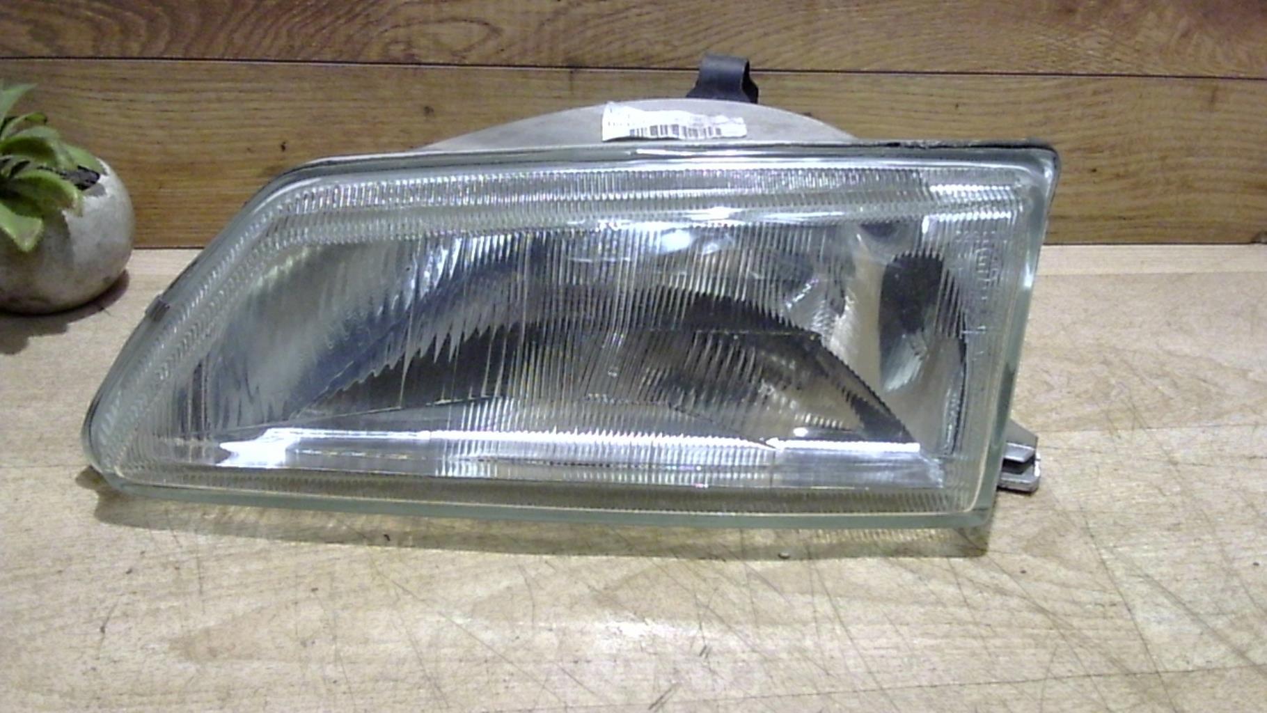 Optique avant principal gauche (feux)(phare)