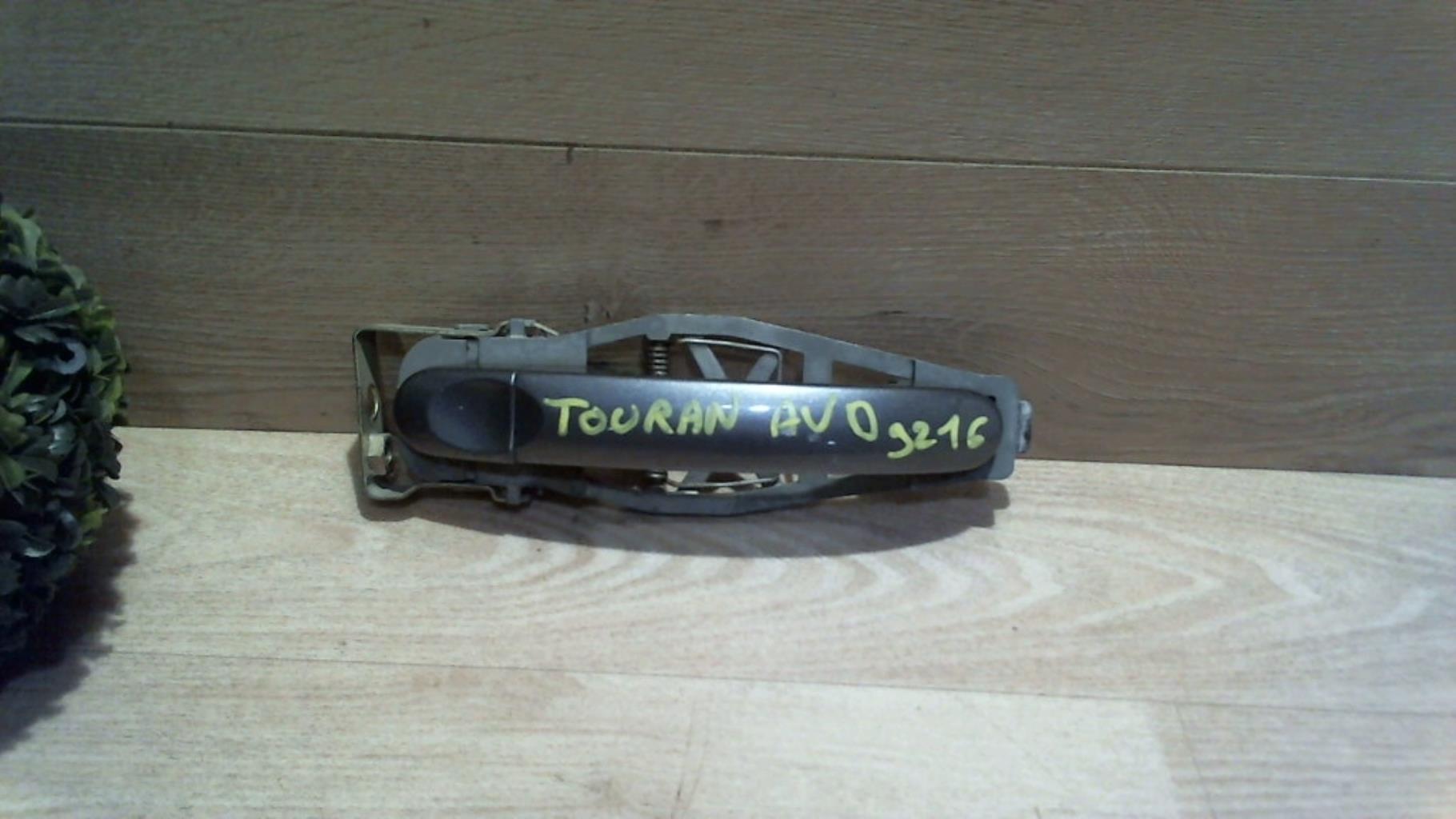 Poignee porte avant droit