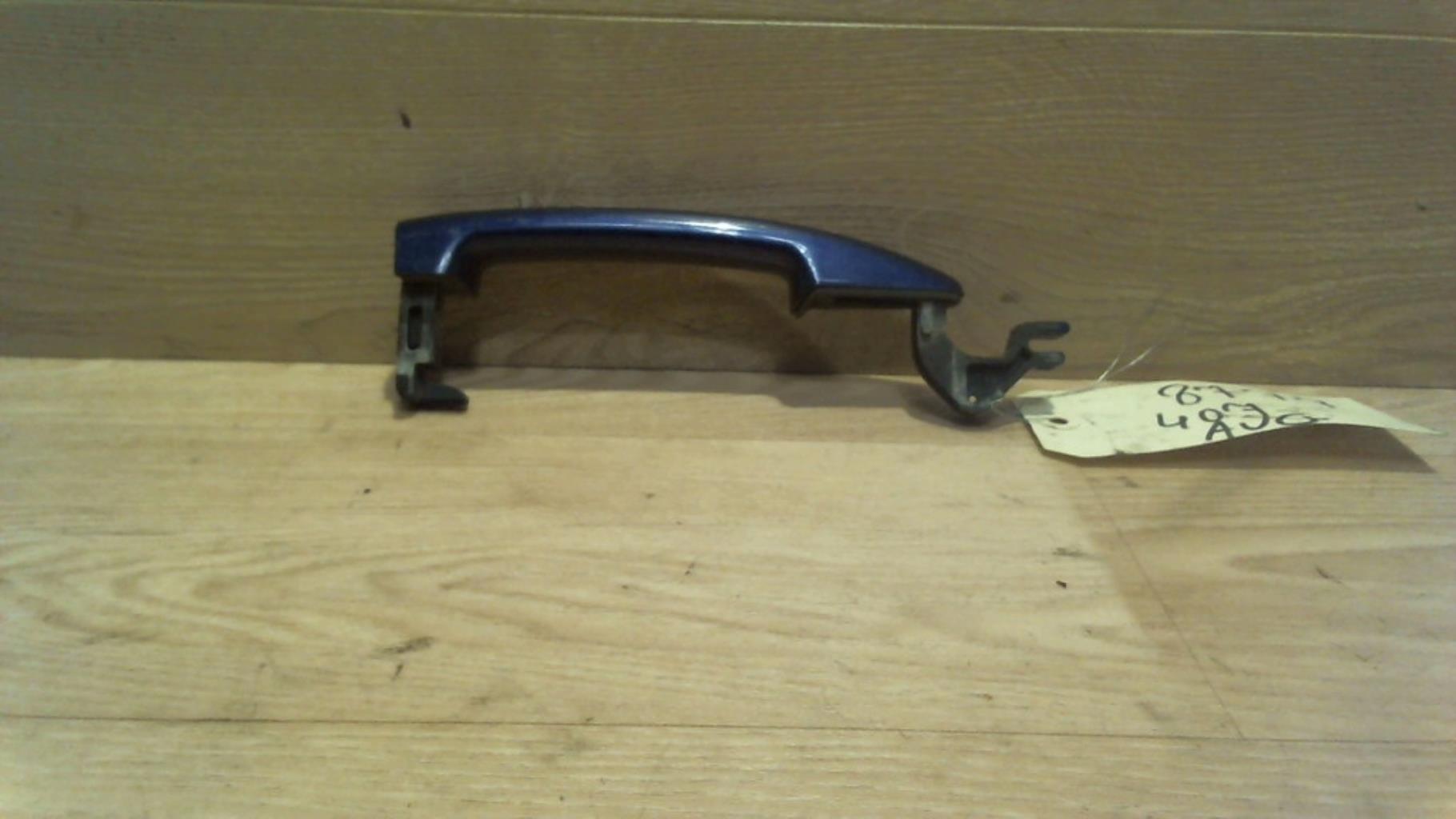Poignee porte laterale gauche