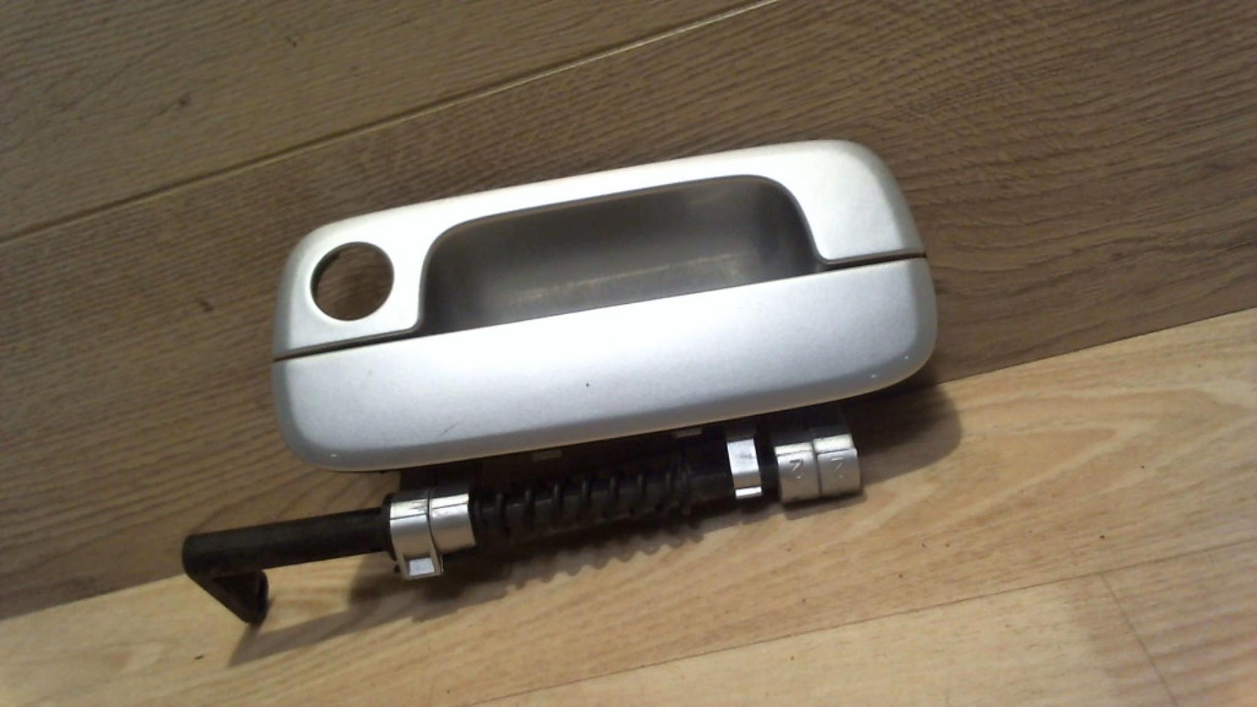 Poignee porte laterale gauche