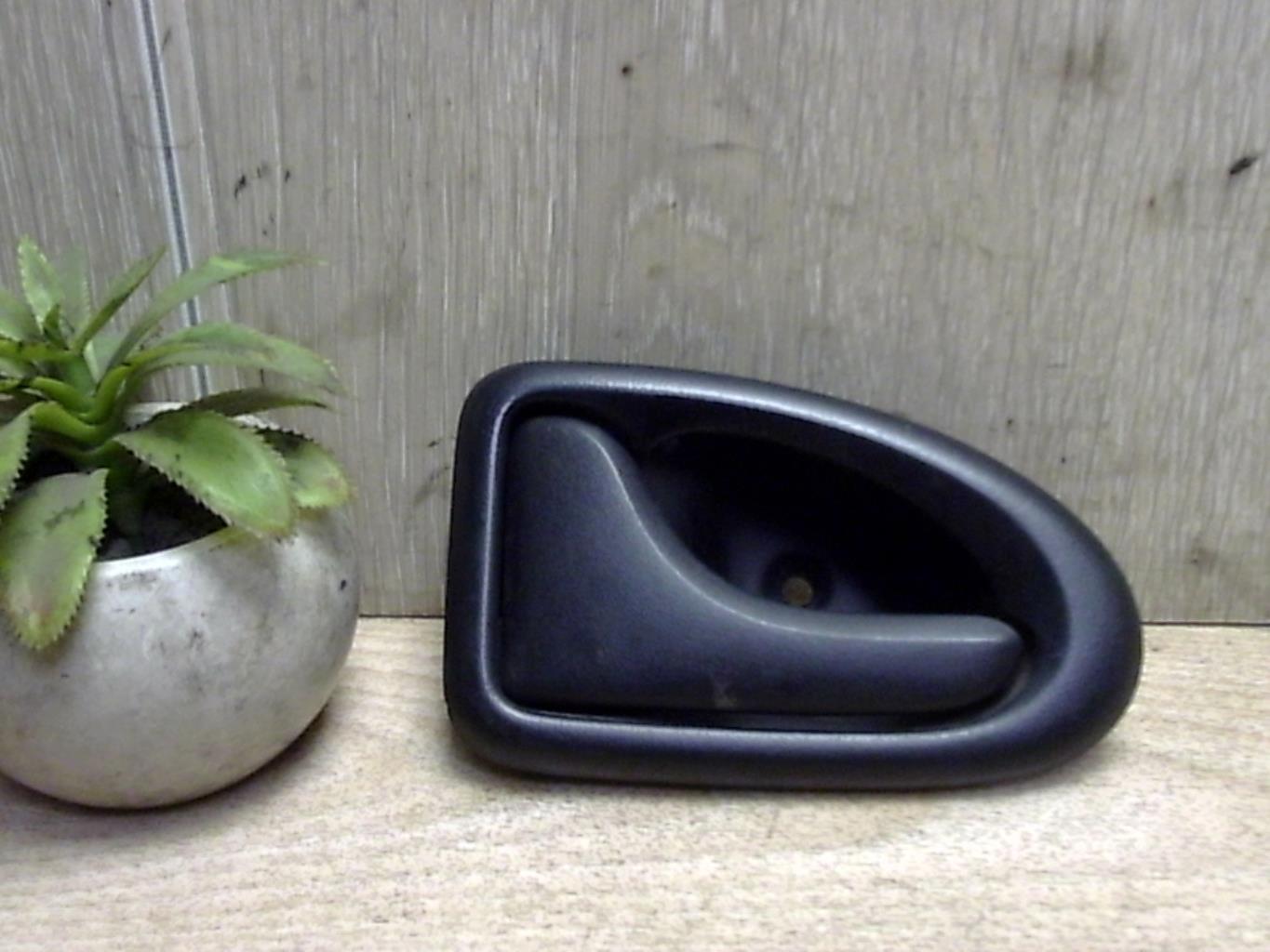 Poignee interieur avant gauche