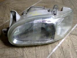 Optique avant principal gauche (feux)(phare)