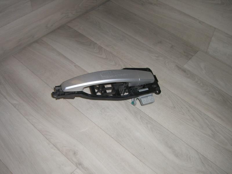Poignee porte avant droit