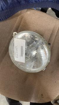 Optique avant principal gauche (feux)(phare)
