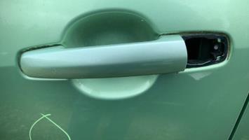 Poignee porte avant gauche