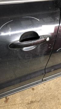Poignee porte avant gauche