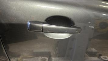 Poignee porte avant droit