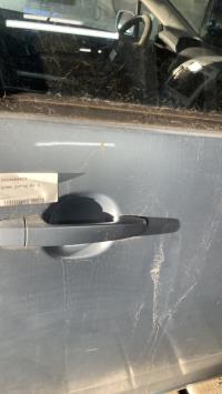 Poignee porte avant droit