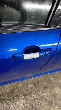Poignee porte avant gauche