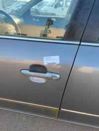 Poignee porte avant gauche