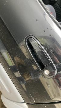 Poignee porte avant gauche
