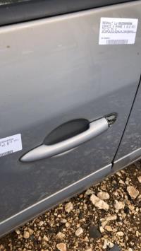 Poignee porte avant gauche