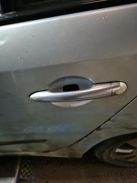 Poignee porte arriere gauche