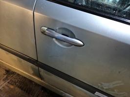 Poignee porte avant droit