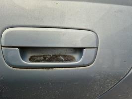 Poignee porte arriere gauche