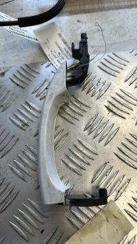 Poignee porte avant gauche
