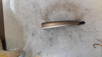 Poignee porte avant gauche