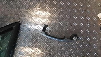 Poignee porte avant gauche