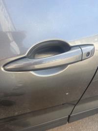 Poignee porte avant gauche