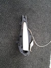 Poignee porte avant gauche