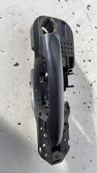 Poignee porte avant gauche